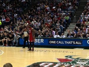 Lebron James At The Bradley Center with a Gruber Law "One Call, That's All" banner sign