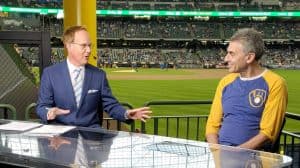 David gruber being interviewed before a brewers game