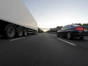 Commercial Truck on Highway Near Sedan in Milwaukee, WI