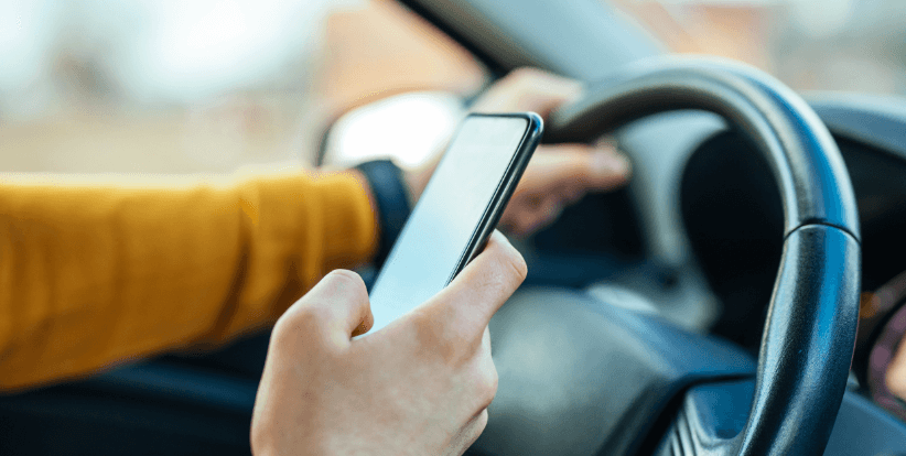 distracted driving woman texting while driving dangerous