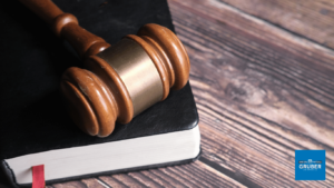 Gavel and book on a desk close up